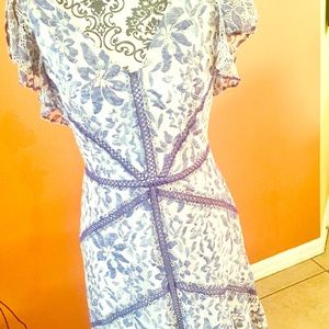 Gorgeous spring dress with flutter sleeve $60